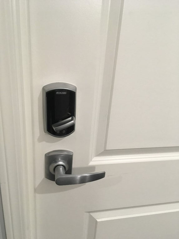 Hollow metal door with industrial Schlage bolt lock